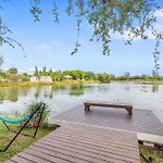 Tropical Oasis Located Near Lake With Pool And Hot Tub